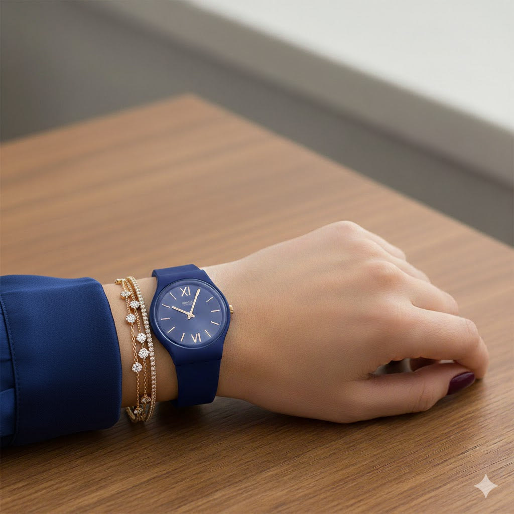 Montre Swatch Bleue Marine Élégante avec Détails Dorés